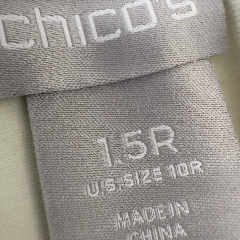 Chico's So-Slimming Black and White Patterned Ankle Pants with Pom Pom Details - Picture 7 of 9